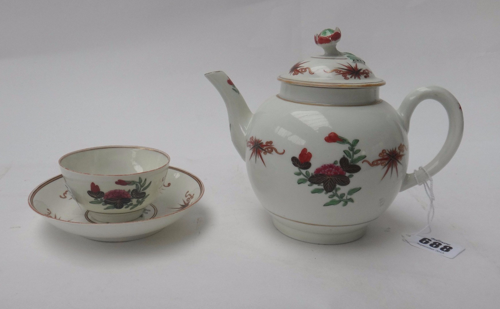 Appraisal: A Worcester globular teapot and cover and a teabowl and