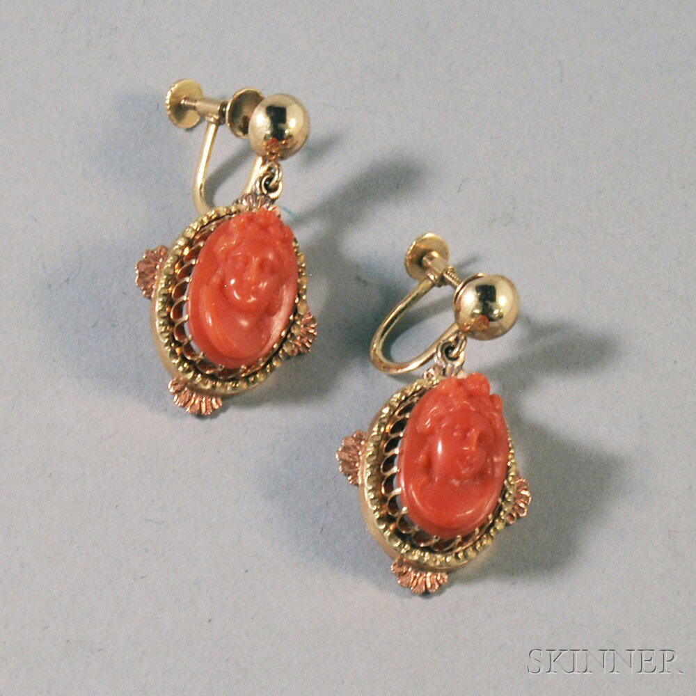 Appraisal: Pair of kt Gold and Carved Coral Earpendants the coral