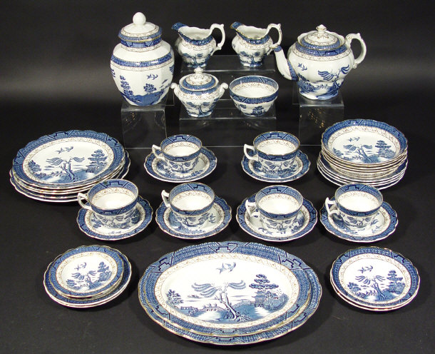 Appraisal: Extensive Royal Doulton and Booths willow patterned tea service comprised