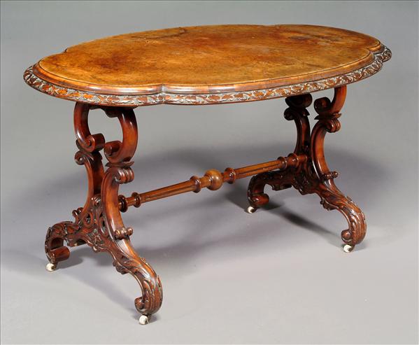 Appraisal: A Victorian walnut and burr walnut centre table circa the