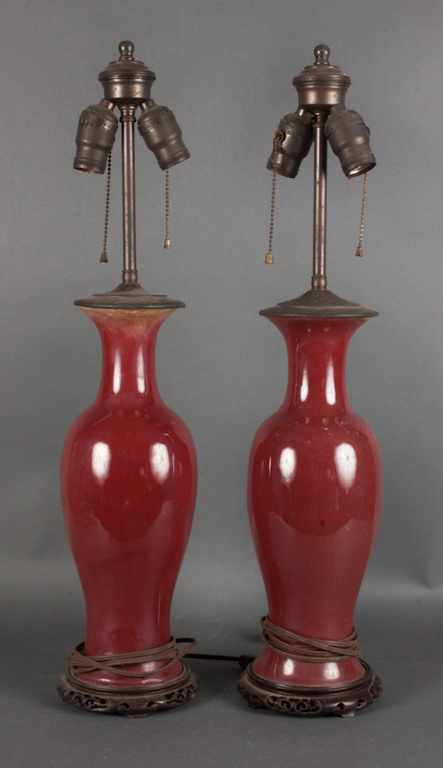 Appraisal: Pair of Chinese sang de bouef porcelain vases mounted as