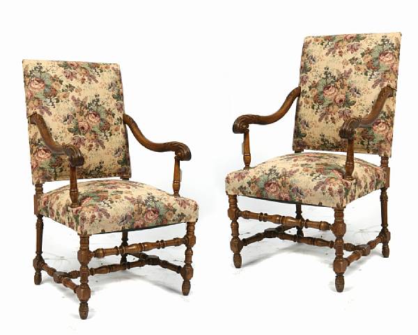 Appraisal: A pair of Baroque style carved walnut upholstered armchairs height