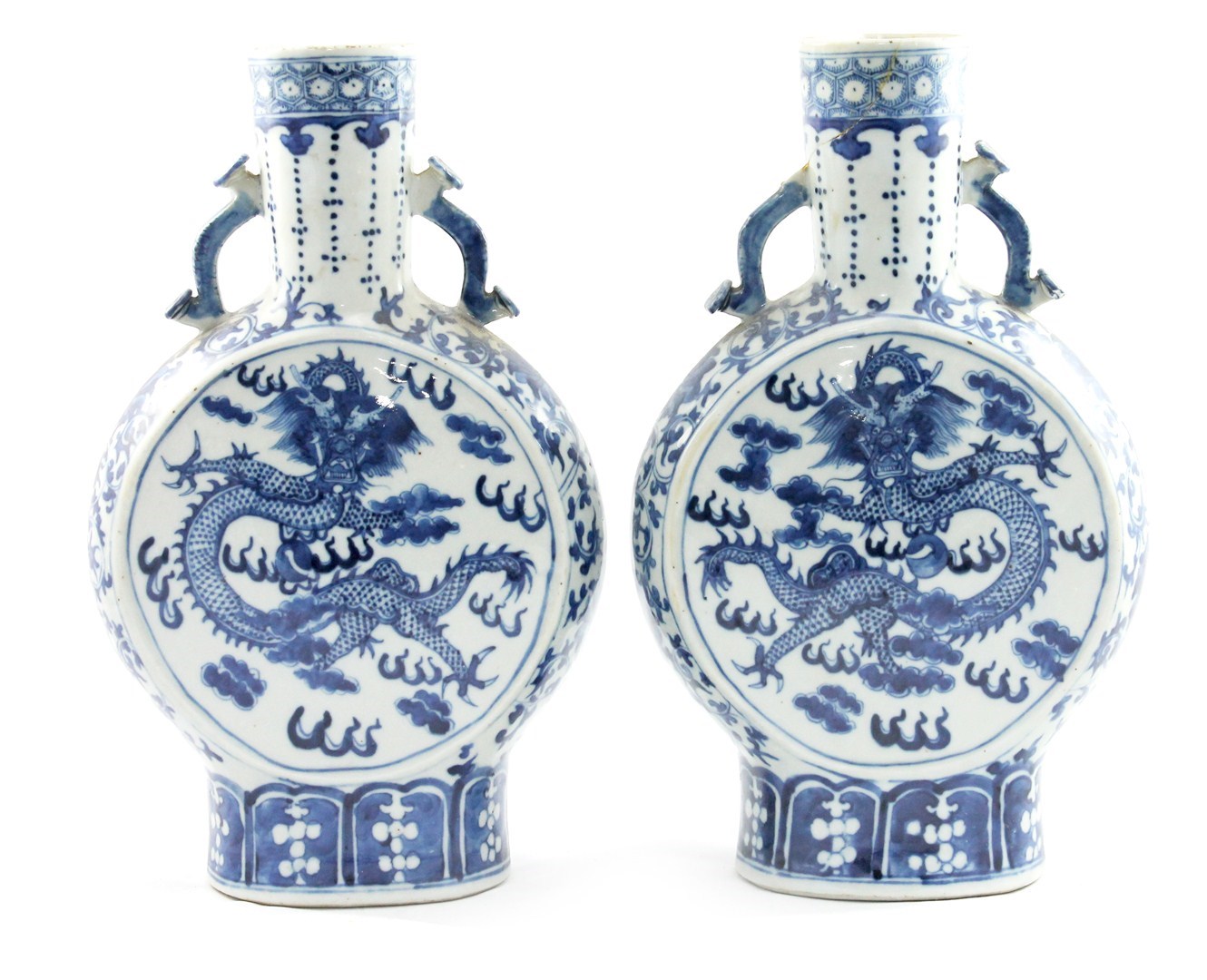 Appraisal: A pair of Chinese blue and white two-handled moonflasks late