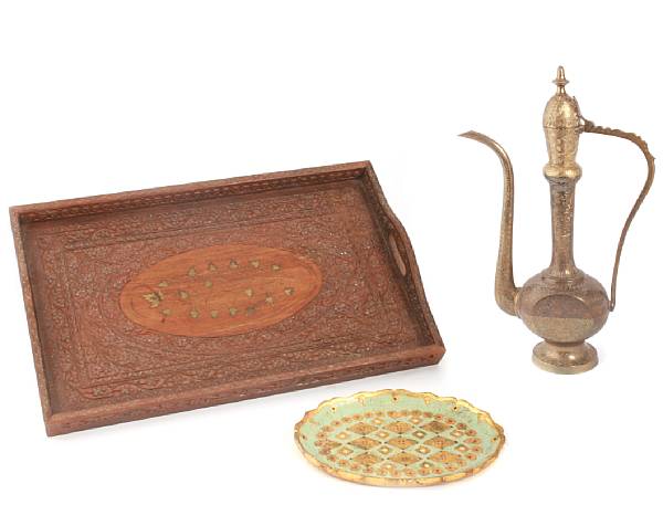 Appraisal: A group of Indian decorations including two brass covered pouring