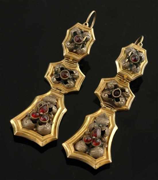 Appraisal: A pair of Antique garnet earrings Each earring comprising three