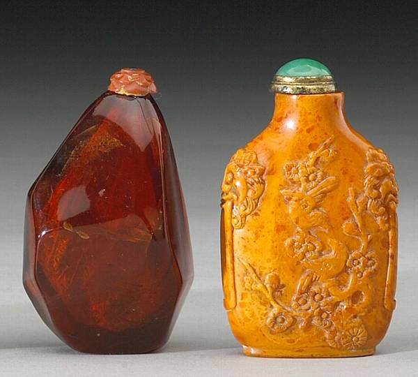 Appraisal: Two amber snuff bottles th Century The first of opaque