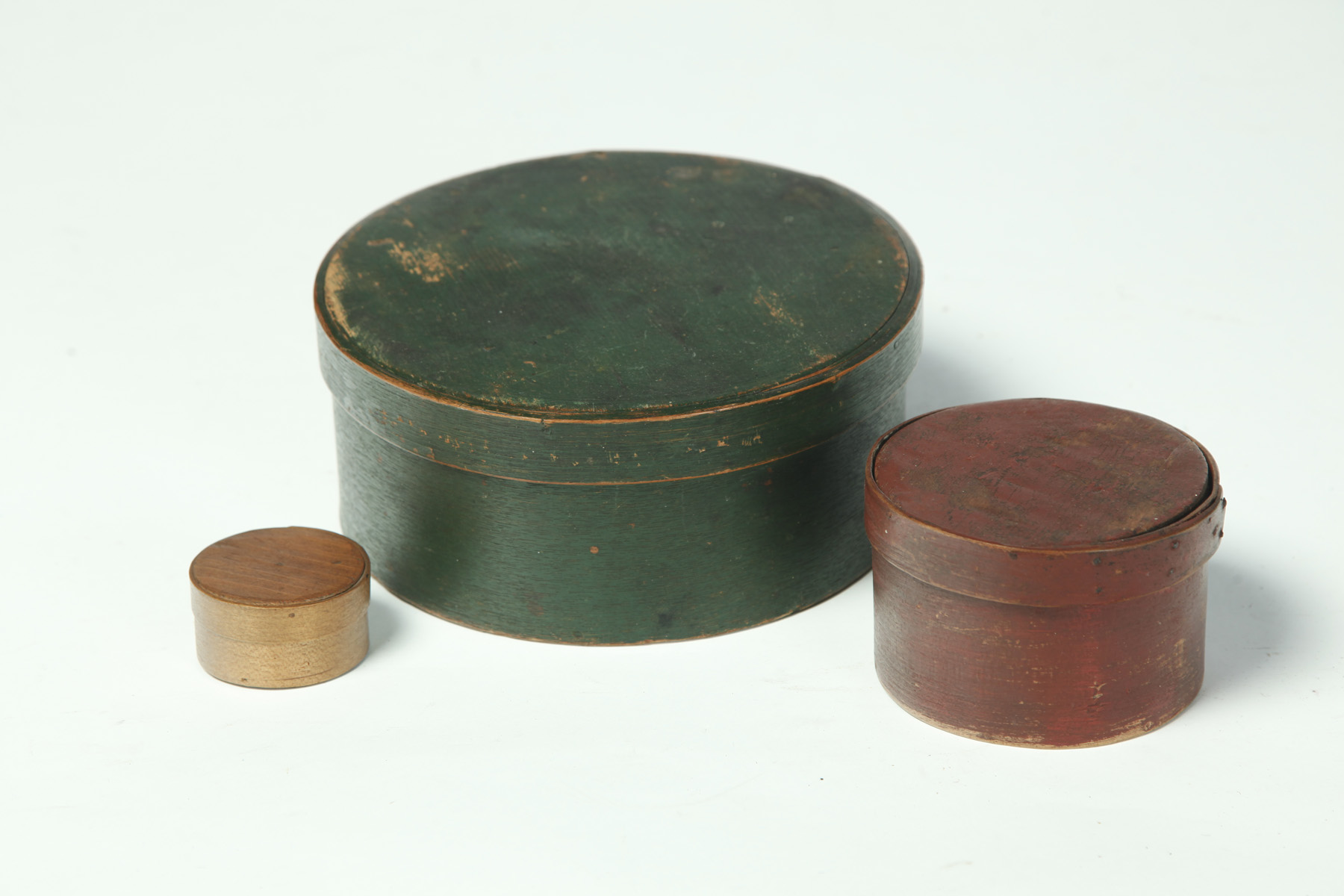 Appraisal: THREE AMERICAN BOXES Second half- th century Round bentwood with