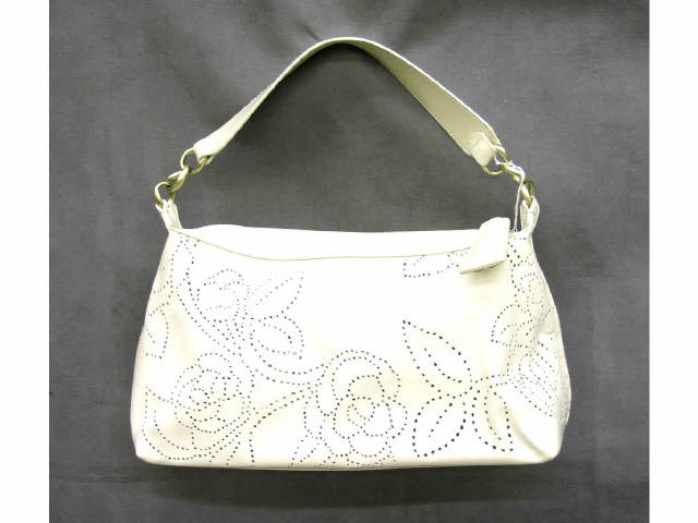 Appraisal: Chanel handbag cream ivory patent leather with pierced floral design