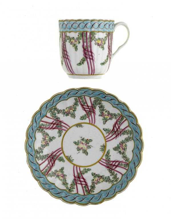 Appraisal: A WORCESTER HOP TRELLIS PATTERN REEDED COFFEE CUP AND SAUCER