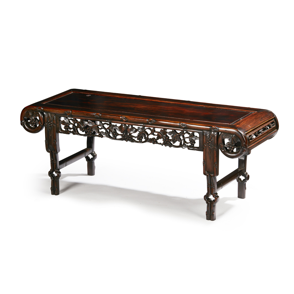 Appraisal: HARDWOOD COFFEE TABLE the rectangular top with scroll ends flanking