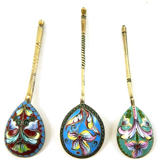 Appraisal: RUSSIAN SILVER Three similar Russian enamel spoons with floral polychrome