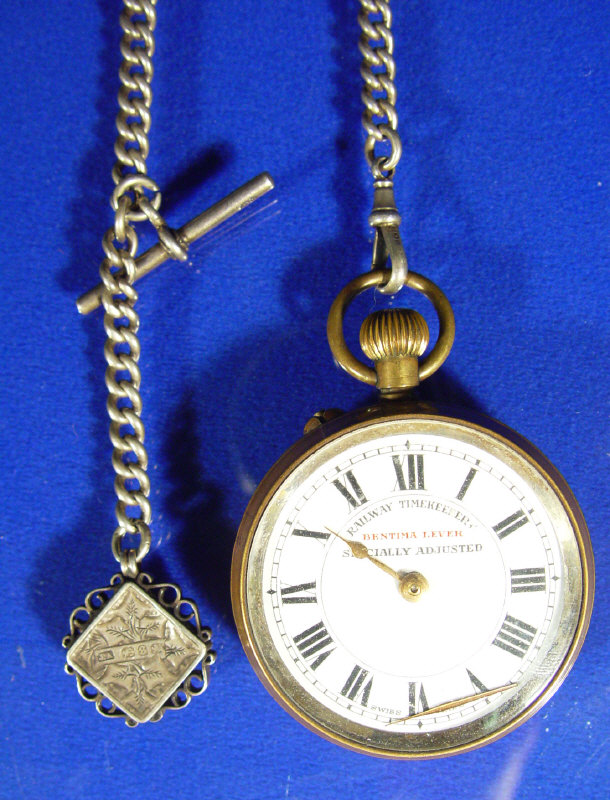 Appraisal: Railway pocket watch on a silver chain with a compass