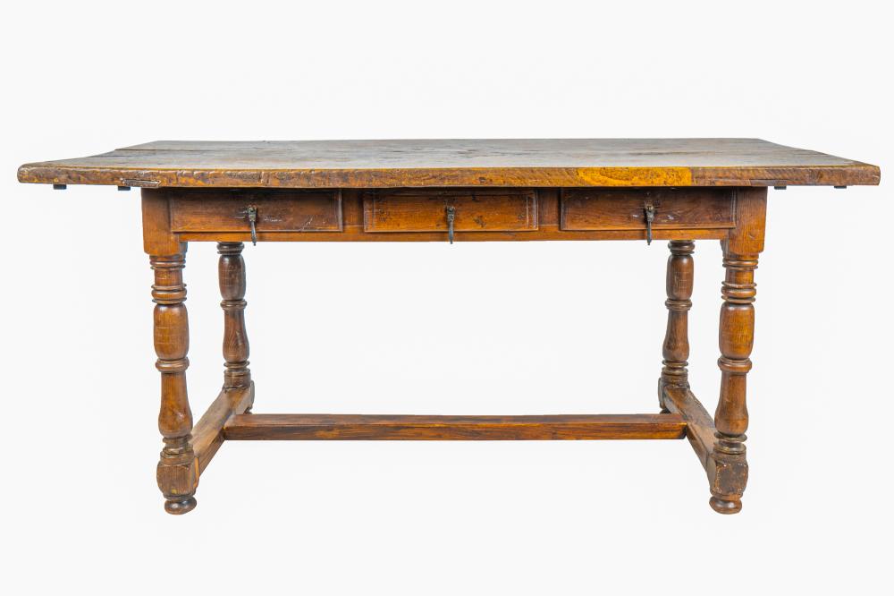 Appraisal: SPANISH-STYLE CARVED OAK TRESTLE TABLECondition with restorations wear and splitting