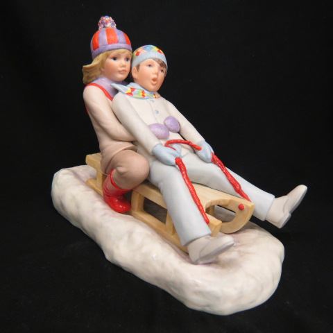 Appraisal: Cybis Porcelain Figurine of Boy Girl on a sled x