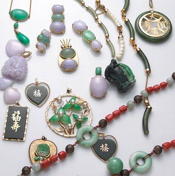 Appraisal: A collection of jade jewelry and loose jade items including