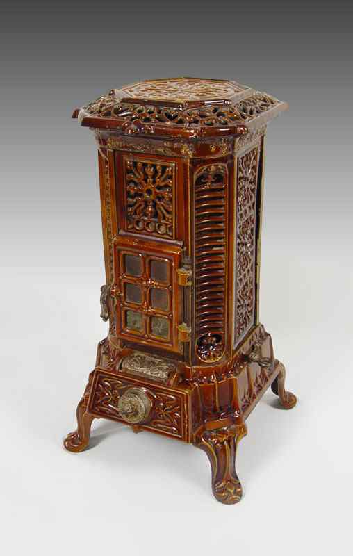 Appraisal: EARLY 'S FRENCH STOVE BY DEVILLE CO Brown glaze ceramic