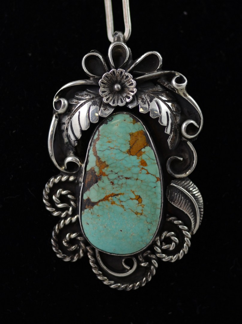 Appraisal: Navajo sterling necklace with turquoise cabochon and handmade chain pendant