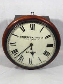 Appraisal: A mahogany wall clock by Camerer Cuss Co with day