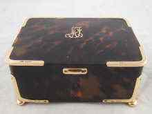 Appraisal: A tortoiseshell trinket box with carat gold mounts hallmarked for