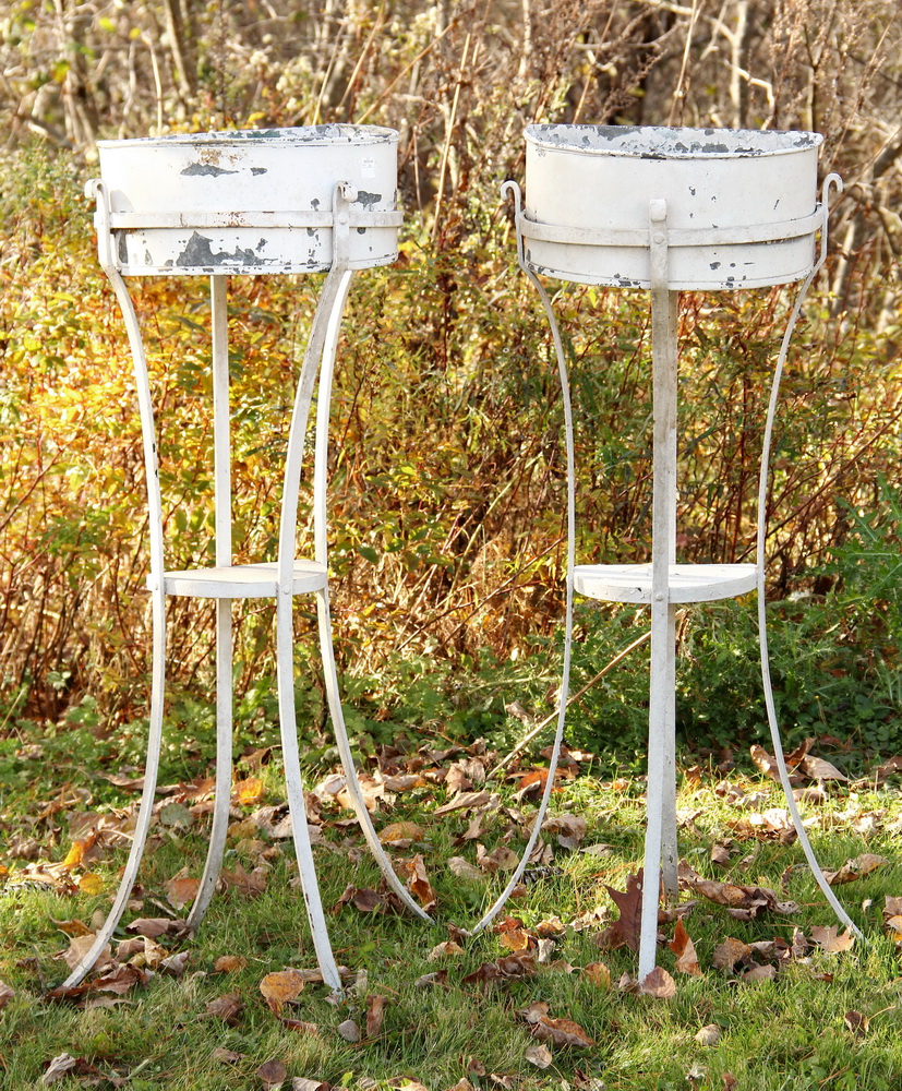 Appraisal: PAIR OF METAL PLANT STANDS - Small Demi-Lune Planters in