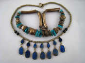 Appraisal: Two ethnic white metal necklaces one with turquoise beads the