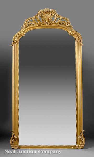 Appraisal: An Antique Louis XV-Style Carved Giltwood Pier Mirror late th