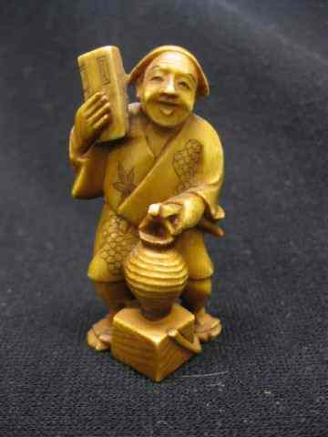 Appraisal: Chinese Carved Ivory Figure of Manwith book and implements signed