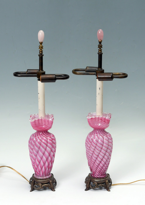 Appraisal: PAIR ART GLASS BOUDOIR LAMPS Pink and white swirl art