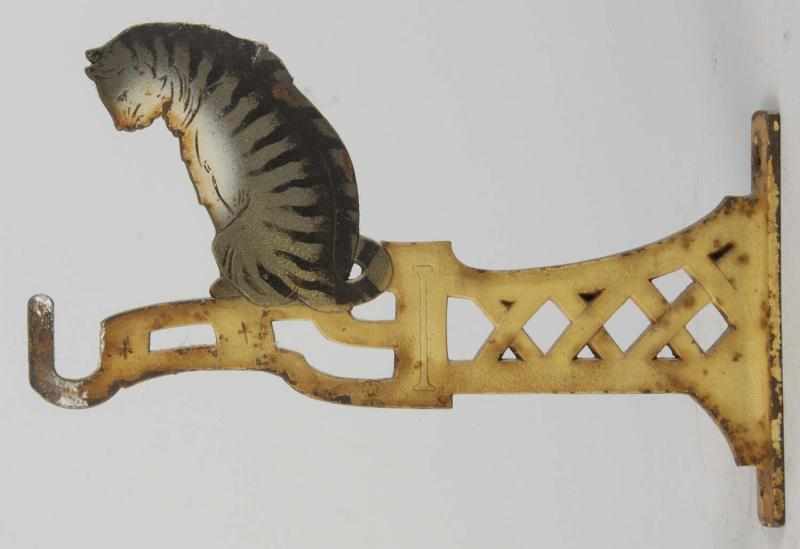 Appraisal: Cast Iron Sitting Tabby Cat Plant Hanger Description Made by