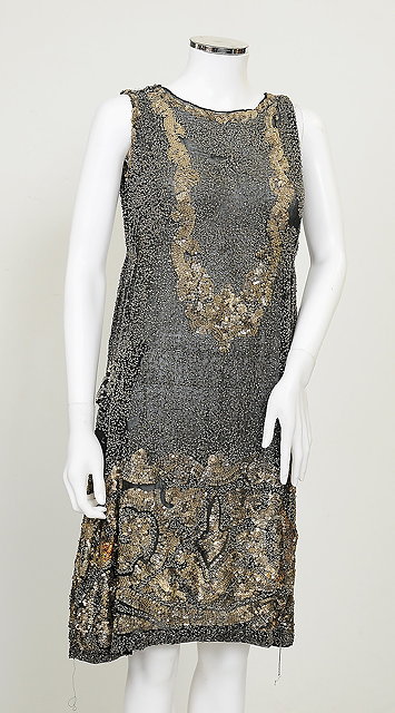 Appraisal: A s heavily beaded and sequinned dress thin black chiffon