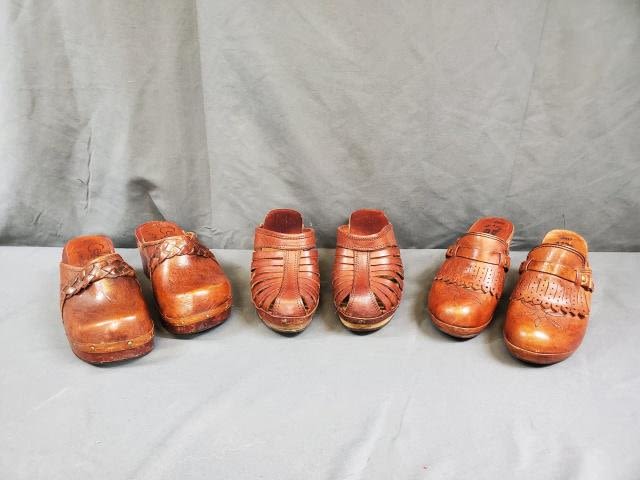 Appraisal: pairs of vintage wood sole clog shoes includes a size