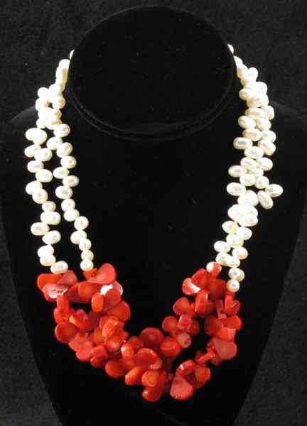 Appraisal: Multi-Strand Pearl and Coral Necklacecomprised of potato shaped fresh water