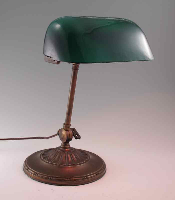 Appraisal: GENUINE EMERALITE ''BANKERS'' LAMP Green cased glass shade adjustable angle