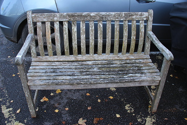 Appraisal: A TEAK GARDEN SEAT with slatted back and with label