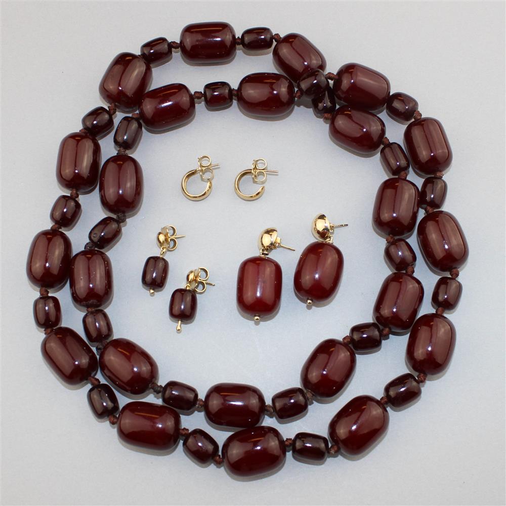 Appraisal: FAUX' CHERRY AMBER NECKLACE WITH TWO PAIRS OF MATCHING EARRINGS