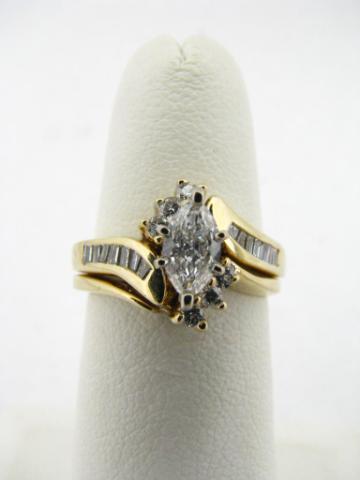 Appraisal: K Yellow gold wedding set wedding ring with marquis center