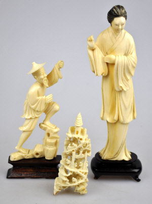 Appraisal: A Chinese ivory carving of a standing maiden cm and