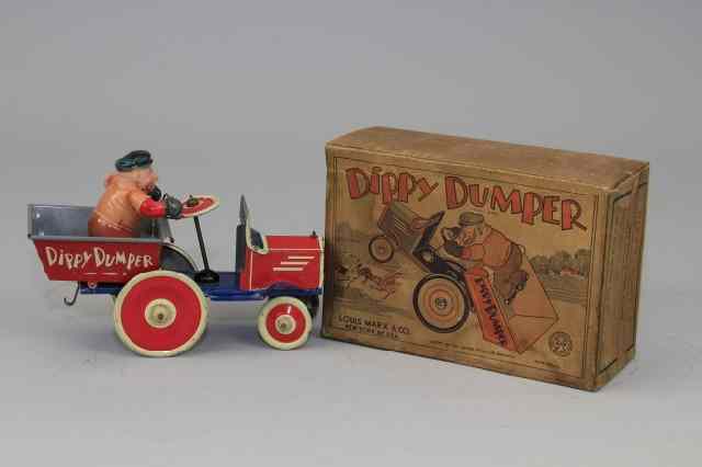 Appraisal: BRUTUS DIPPY DUMPER Marx colorfully lithographed tin colorful boxed example