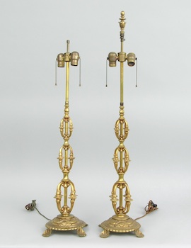 Appraisal: A Pair of Gilt Cast Metal Lamps Approx - H