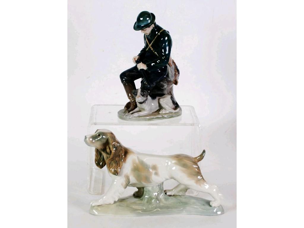 Appraisal: A ROYAL COPENHAGEN PORCELAIN MODEL OF A GAMEKEEPER seated loading