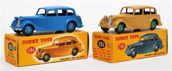 Appraisal: Two Dinky Triumph Saloons one mid-blue body and ridged hubs