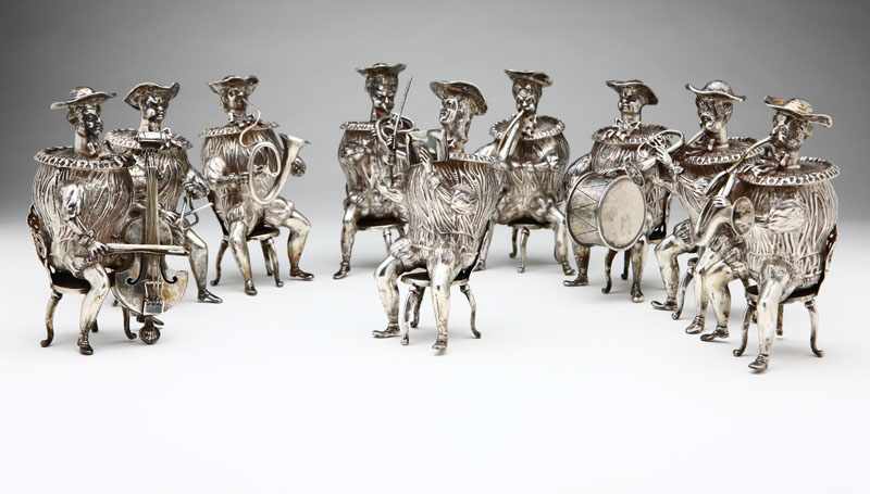 Appraisal: A group of nine German sterling silver fanciful musician figures