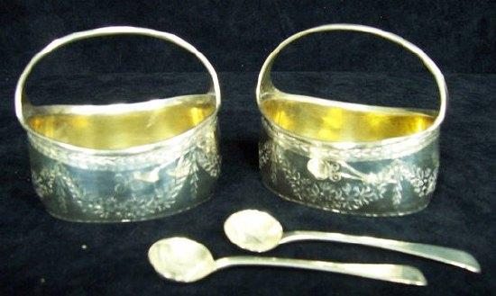 Appraisal: Two oval pail shaped salt cellars with reeded crossover handles