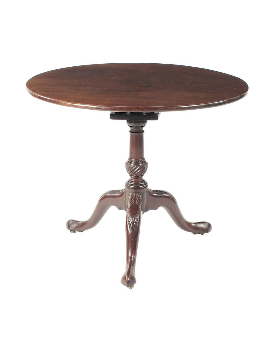 Appraisal: An early George III mahogany tripod table