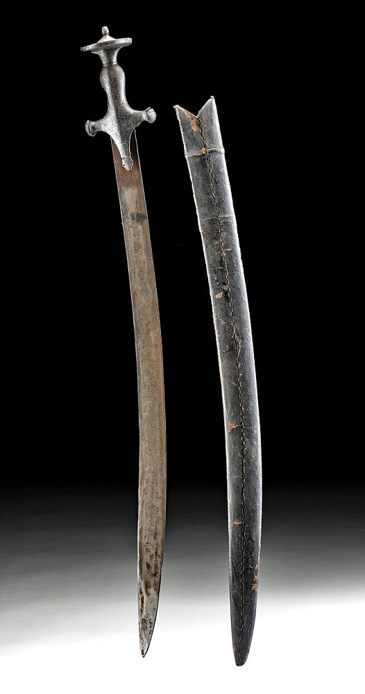 Appraisal: th C Indian Steel Talwar with Leather Scabbard South Asia