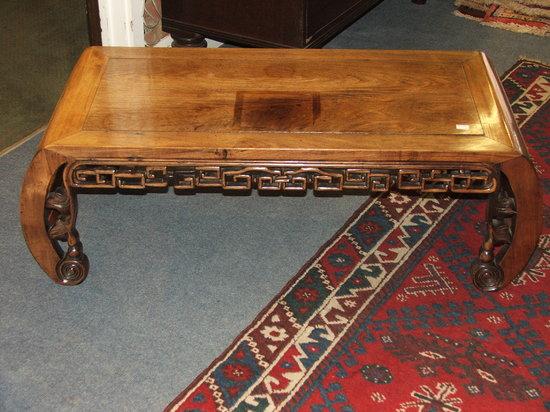 Appraisal: A CHINESE ROSEWOOD LOW TABLE with pierced and carved aprons