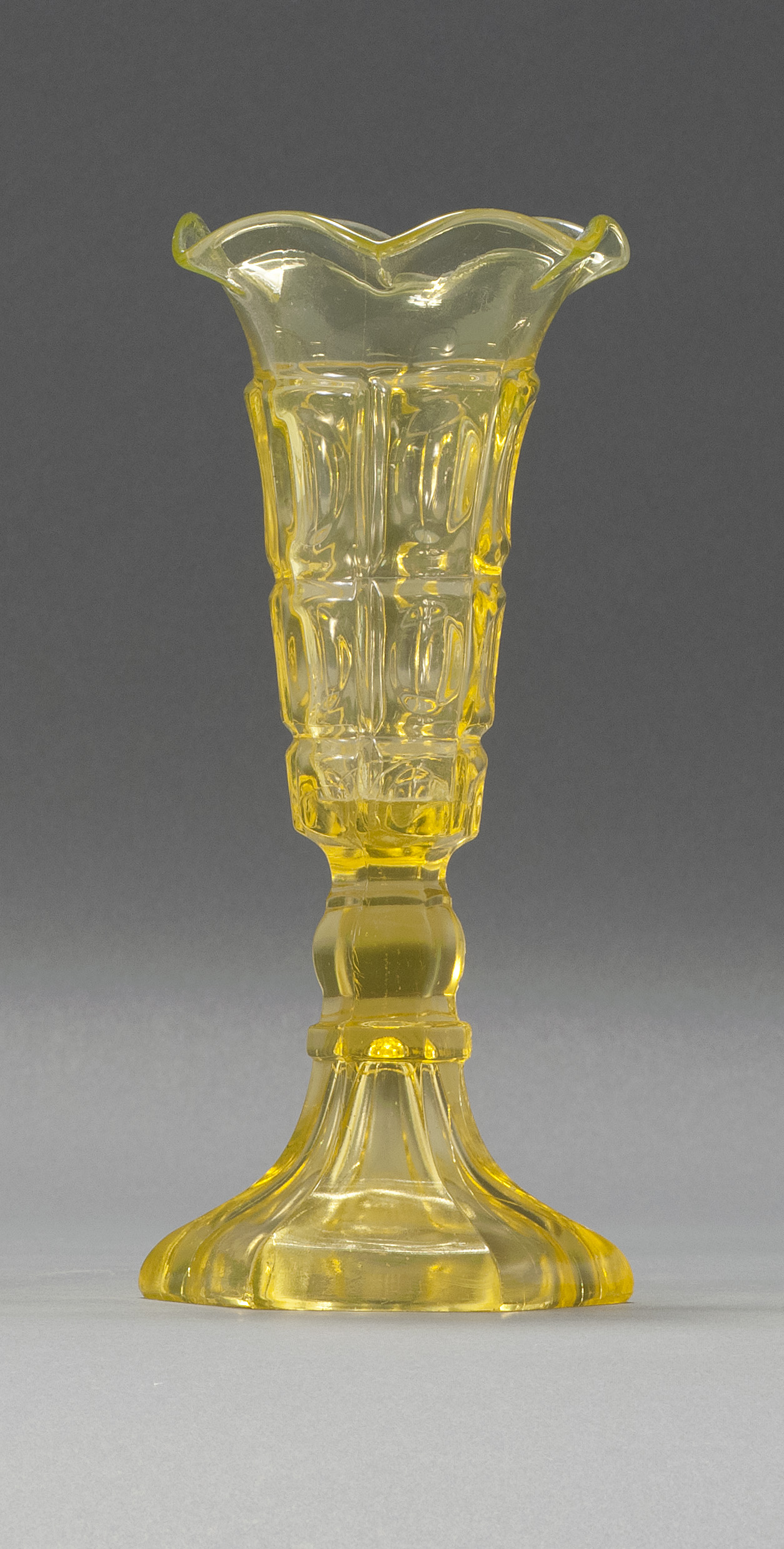 Appraisal: SANDWICH GLASS COMPANY PRESSED GLASS VASE Mid- th CenturyIn Three-Printie