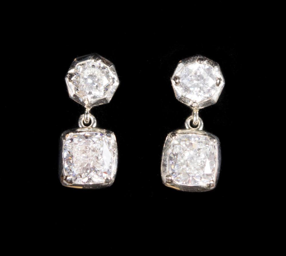 Appraisal: PAIR OF DIAMOND AND EIGHTEEN KARAT GOLD DANGLE EARRINGS with