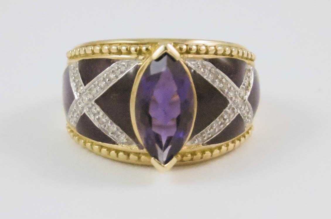 Appraisal: AMETHYST DIAMOND AND FOURTEEN KARAT GOLD RING with round-cut diamonds