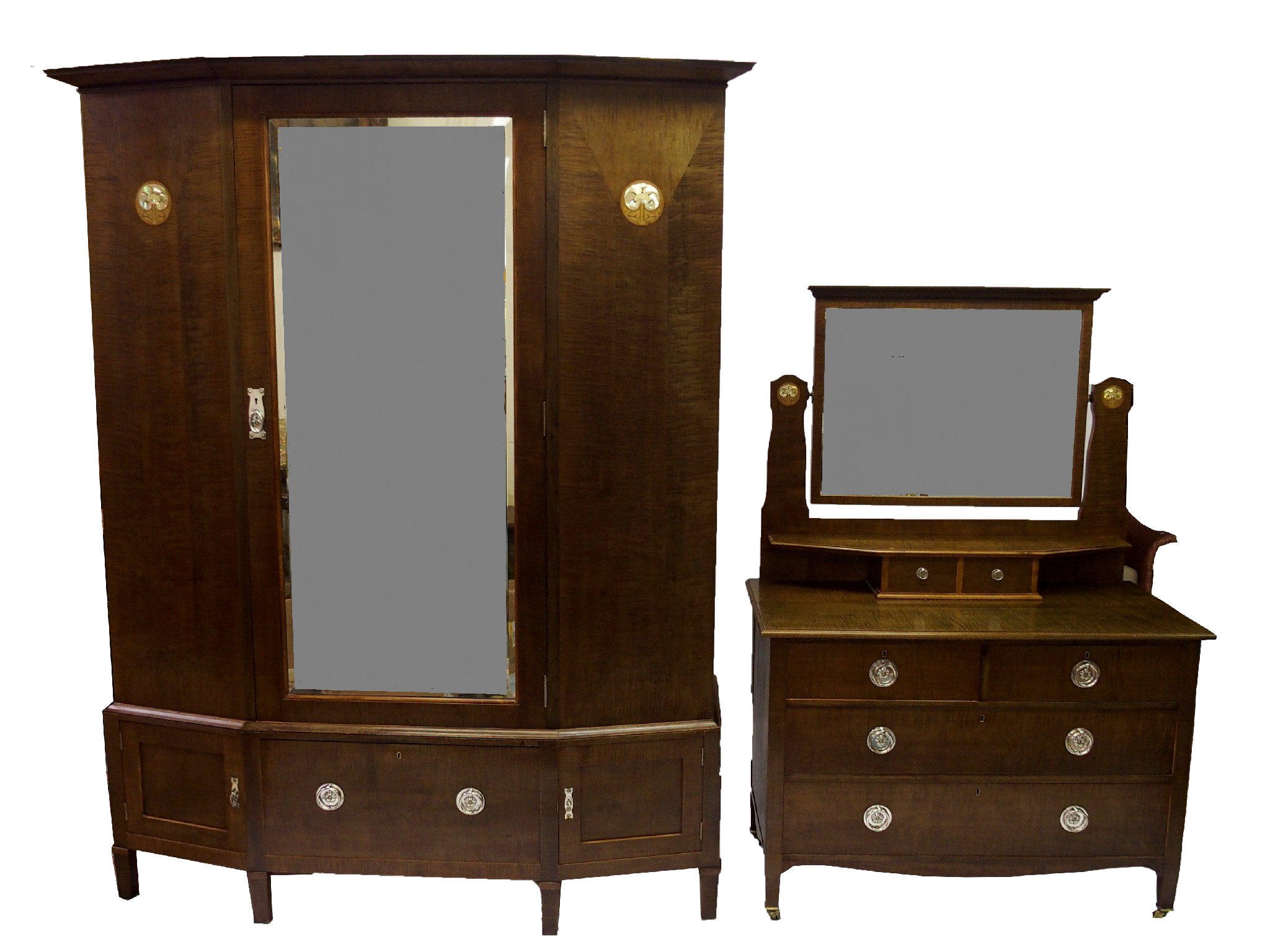 Appraisal: An Arts and Crafts mirror door wardrobeand matching dressing table